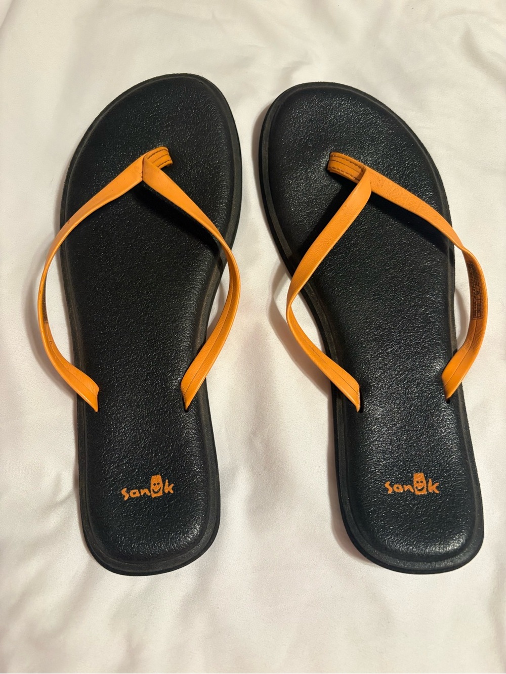 Sanuk Black Flip Flops with Orange Straps